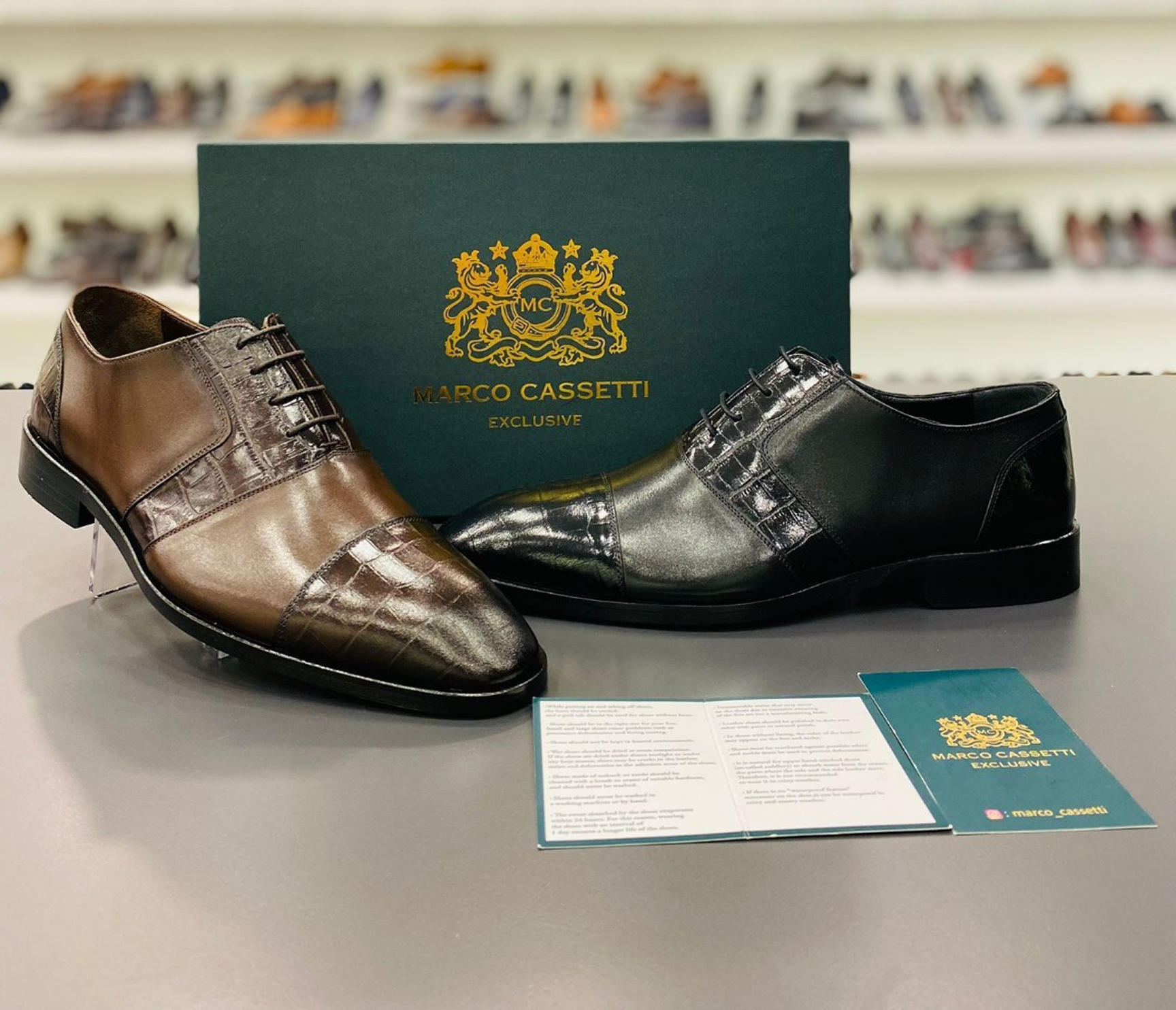 Brown and black formal dress shoes display.