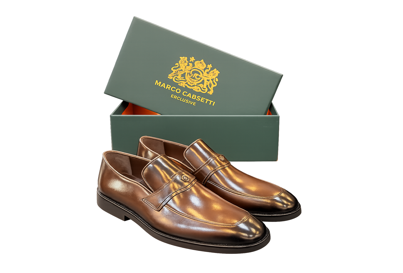 Brown leather loafers with green shoe box.